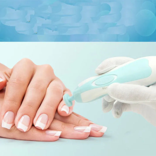 A close-up of a person’s hand receiving a manicure using a light blue and white electric nail file held by a gloved hand, with a soft blue background.