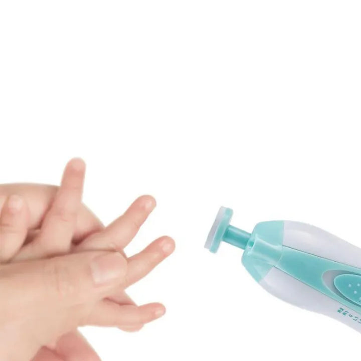 A close-up of an adult hand gently holding a baby’s fingers while using a turquoise and white electric nail file with a round tip against a plain white background.