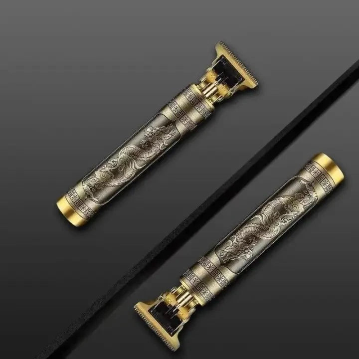 Two ornate hair clippers with intricate designs on a dark background
