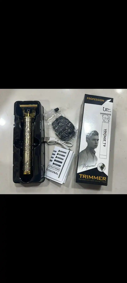 Vintage-style trimmer with packaging and accessories on a light surface

